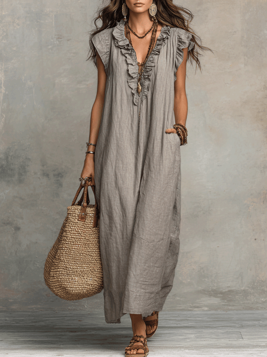 Vestido maxi boémio sem mangas com decote em V e caimento fluido