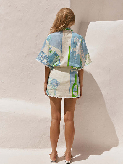 CONJUNTO ESTAMPADO COM SAIA CRUZADA