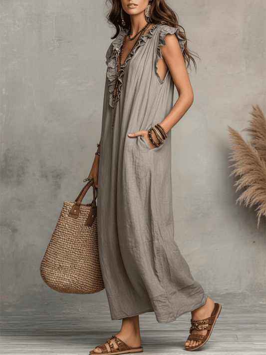 Vestido maxi boémio sem mangas com decote em V e caimento fluido