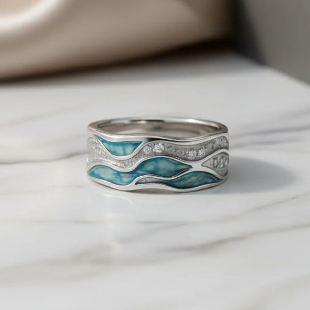 Anel Elegante em Prata com Ondas Turquesas