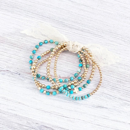 Pulseira com Charme em Cruz de Pérolas Turquesas Vintage