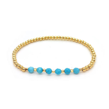 Pulseira com Charme em Cruz de Pérolas Turquesas Vintage